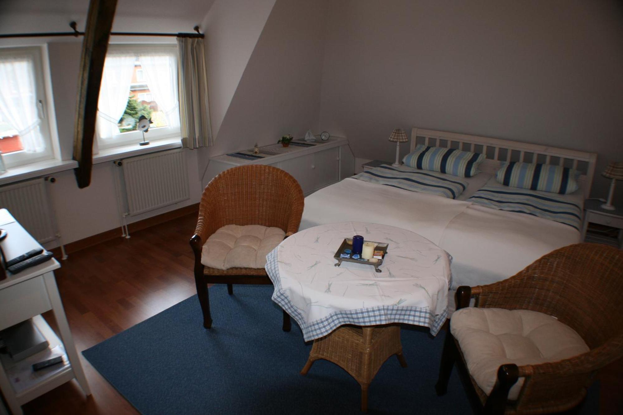 Ferienwohnungen Im Hotel Garni Zur Post Utersum Стая снимка