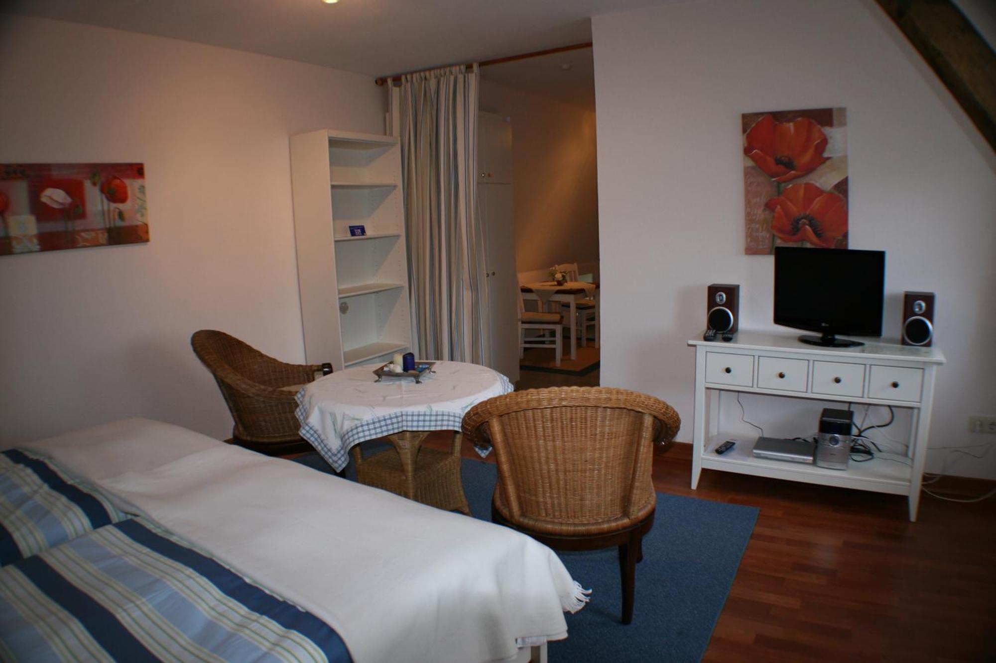 Ferienwohnungen Im Hotel Garni Zur Post Utersum Стая снимка