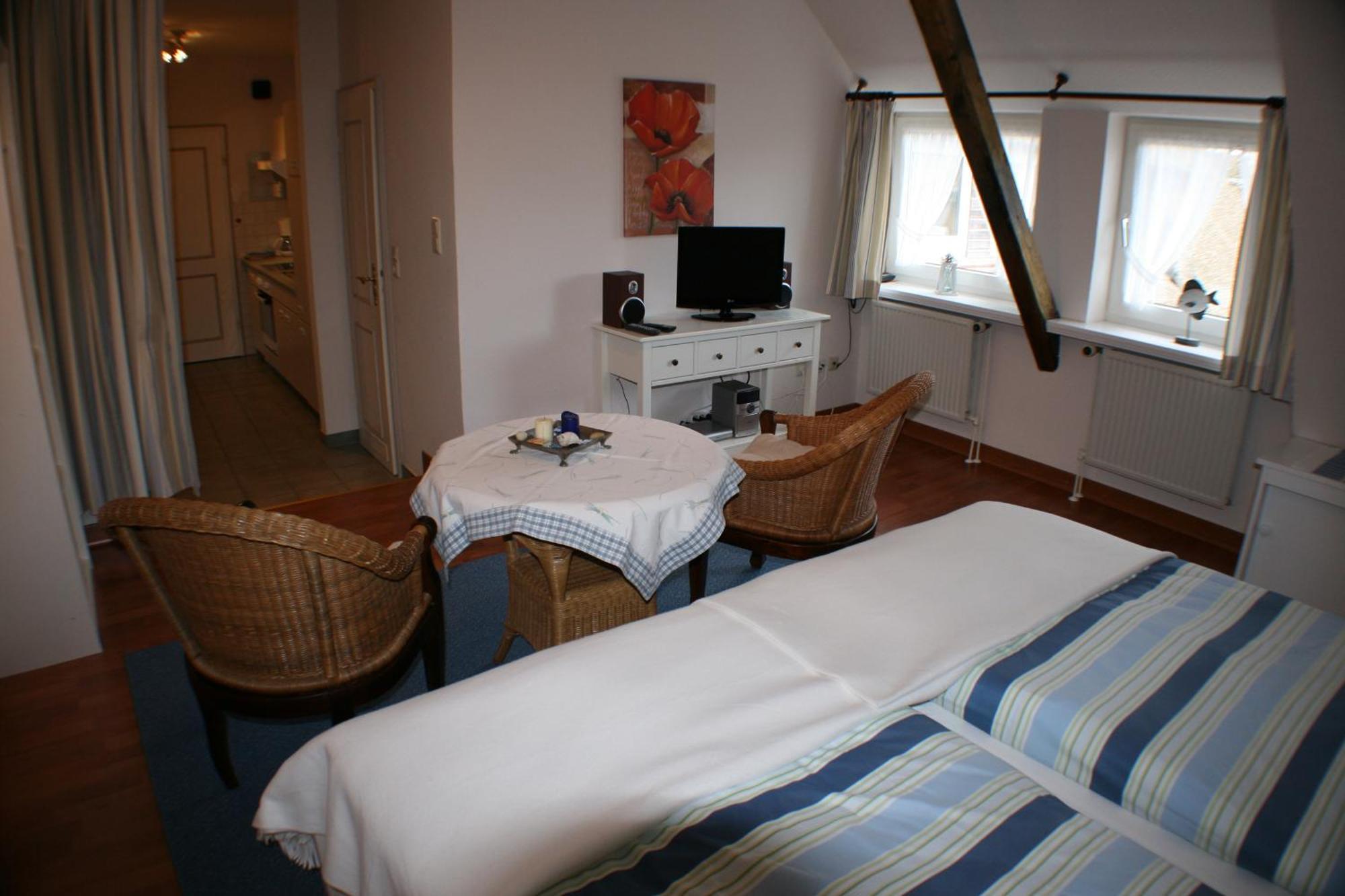 Ferienwohnungen Im Hotel Garni Zur Post Utersum Стая снимка